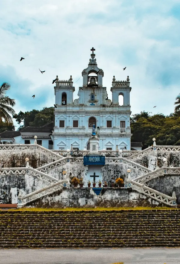 The image displays the Our Lady of the Immaculate Conception Church located in Panjim, Goa, India.