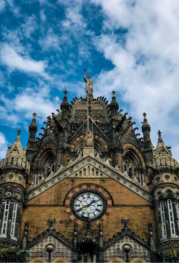 This image shows the top portion of the Chhatrapati Shivaji Maharaj Terminus (formerly Victoria Terminus) in Mumbai, India.