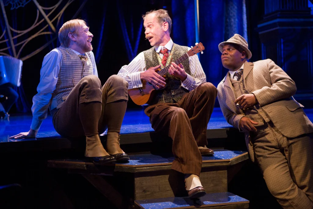 Louis as Feste with James Konicek and Craig Wallace as Andrew Aguecheek and Sir Toby Belch in Twelfth Night Image credit: Folger Theatre Production