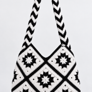 Handmade crochet tote with a bold geometric granny-square pattern.